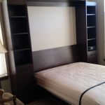 Guest bedroom makeover, custom Murphy bed installed, vertical, wall to wall, small spaces, custom cabinetry. SmartSpaces.com