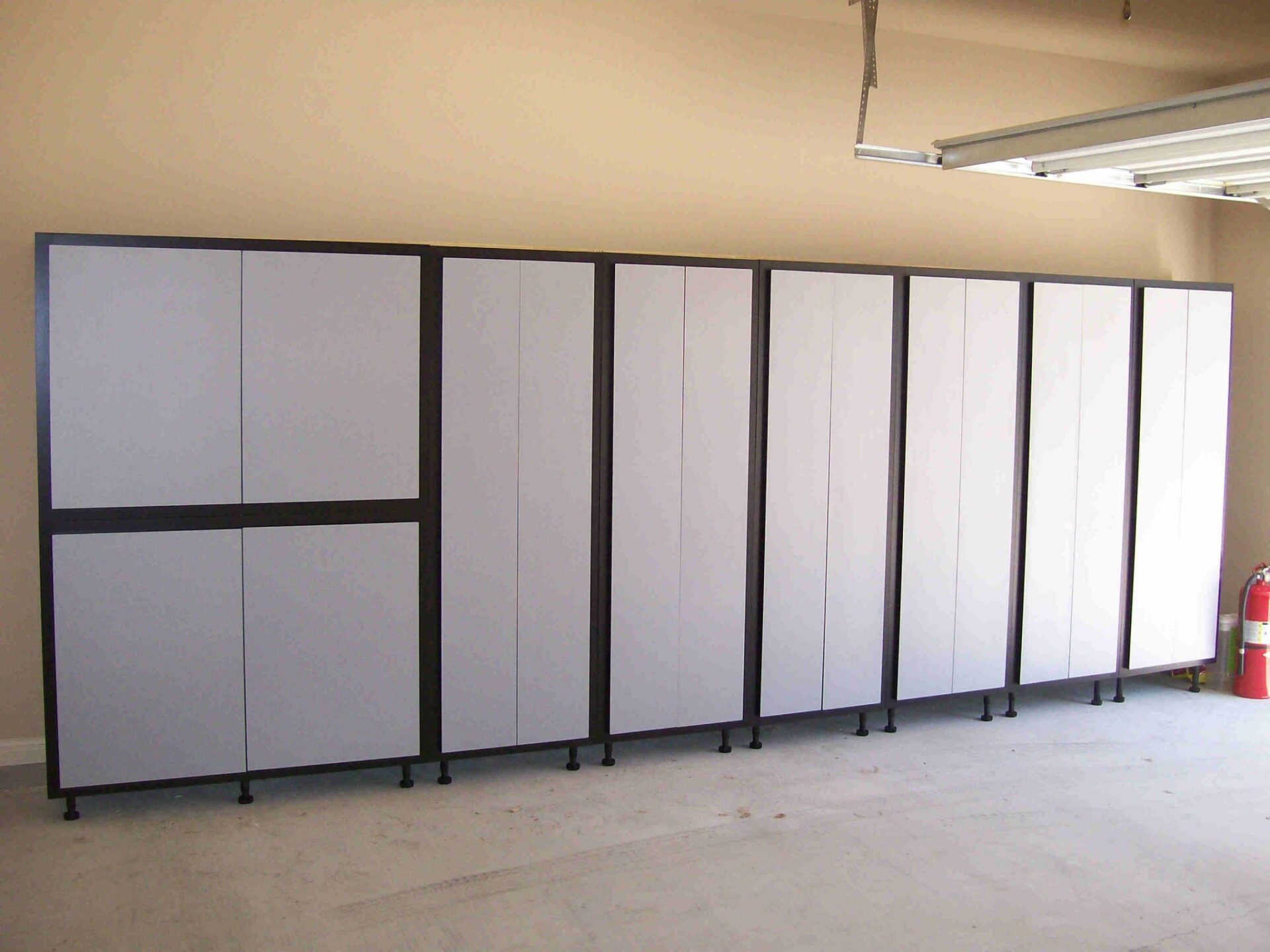 Custom Cabinets in garage, for extra storage. SmartSpaces.com