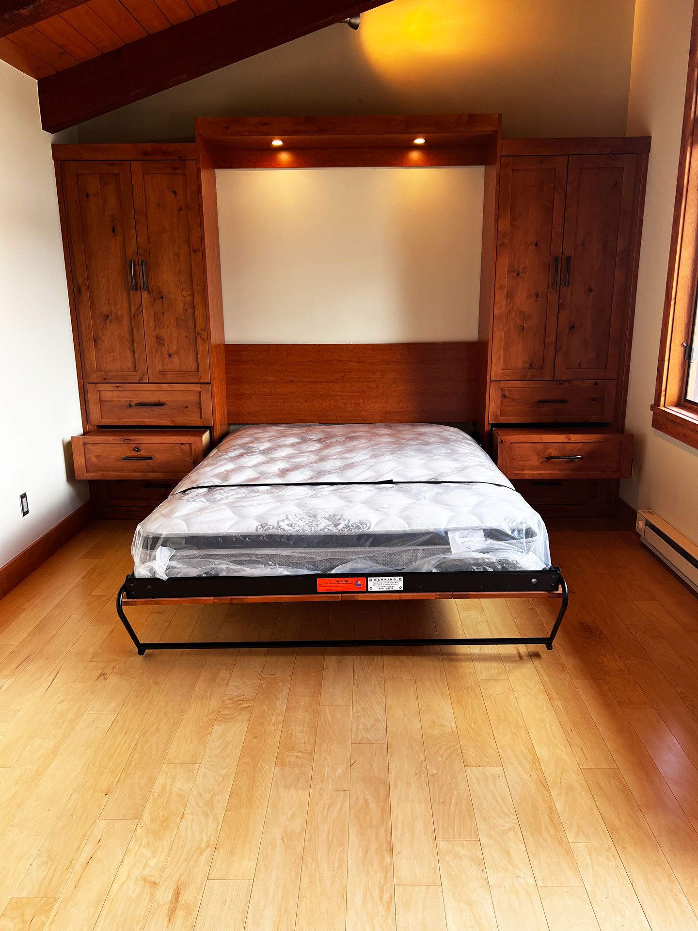 Stained-Knotty-Alder-Murphy-Bed-Open-with-Nightstands